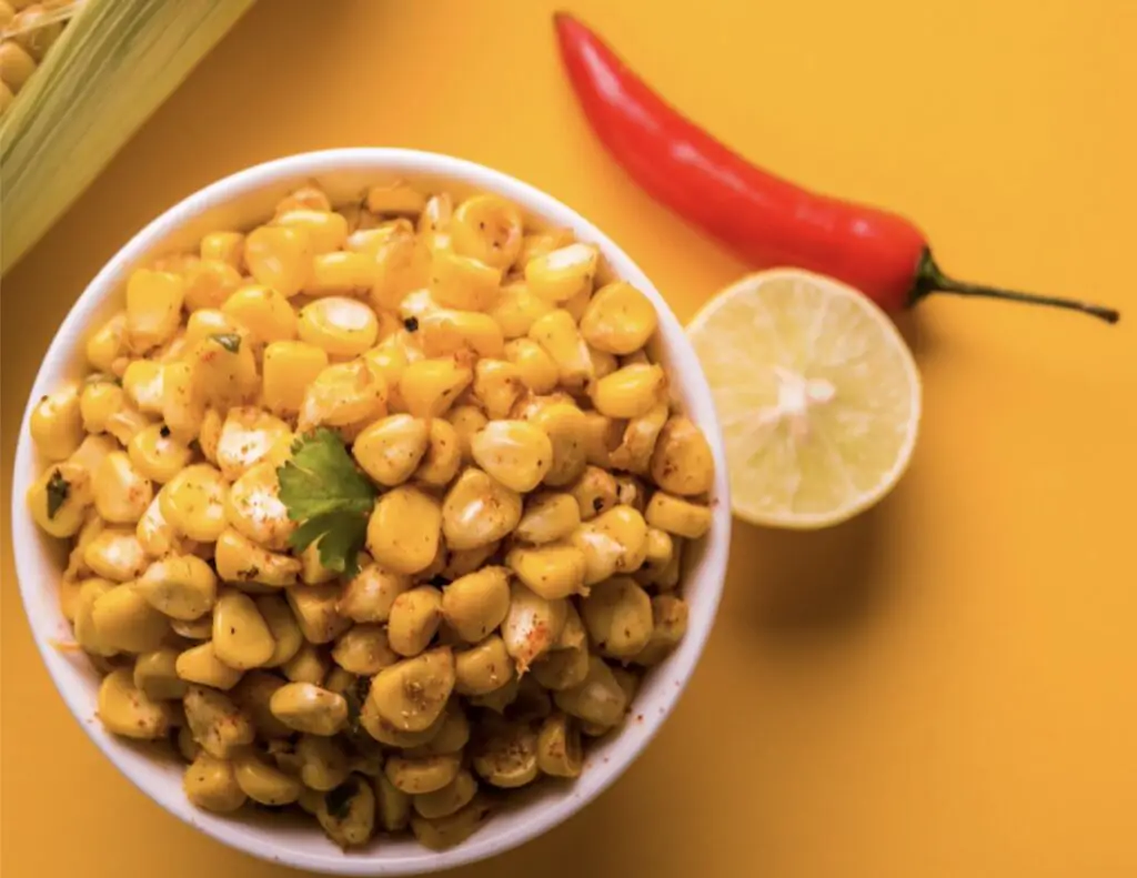 Freshly prepared corn salsa at Chipotle, showcasing the type of corn used by the fast-food chain.