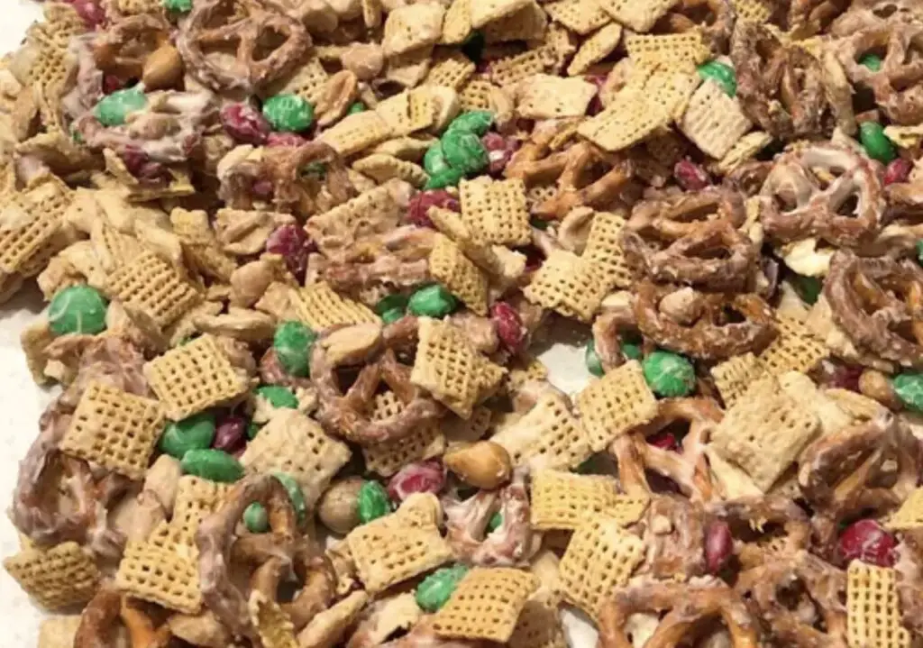 A colorful bowl of Chex Mix showcasing various ingredients like pretzels, cereals, and nuts, representing the diversity of Chex Mix flavors.