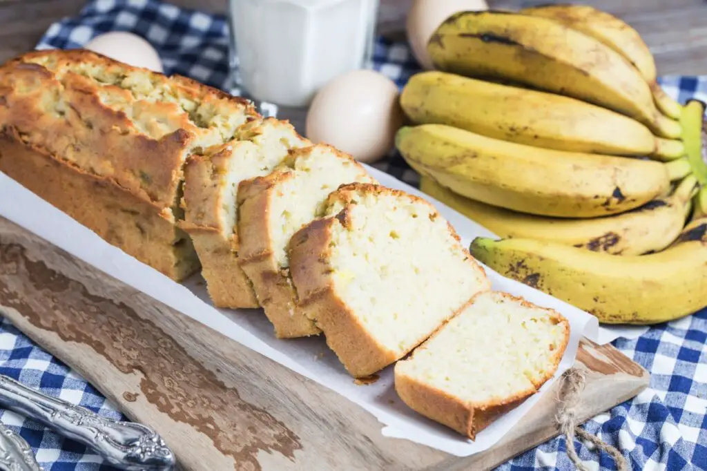 A freshly baked loaf of banana bread with a moist, tender crumb.