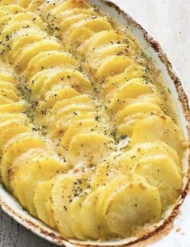 Elevate your comfort food game with Cheesy Scalloped Potatoes, a classic side dish that's creamy, savory, and utterly satisfying.