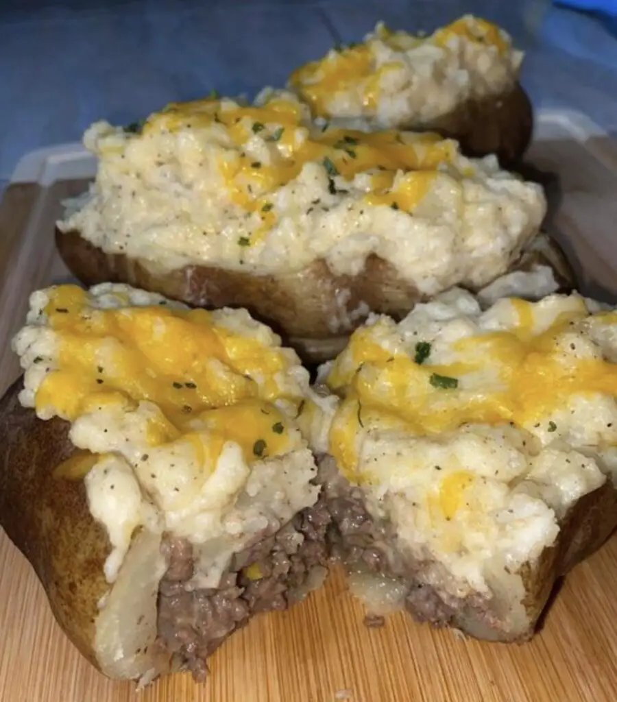 An appetizing image showcasing a Shepherd's Pie Baked Potato, with a perfectly baked potato filled with savory ground meat, vegetables, and a rich gravy. Optional mashed potato topping adds an extra layer of creaminess. 