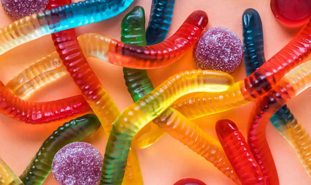 A colorful array of Trolli Gummy Worms, promising a delightful treat without the worry of gluten.